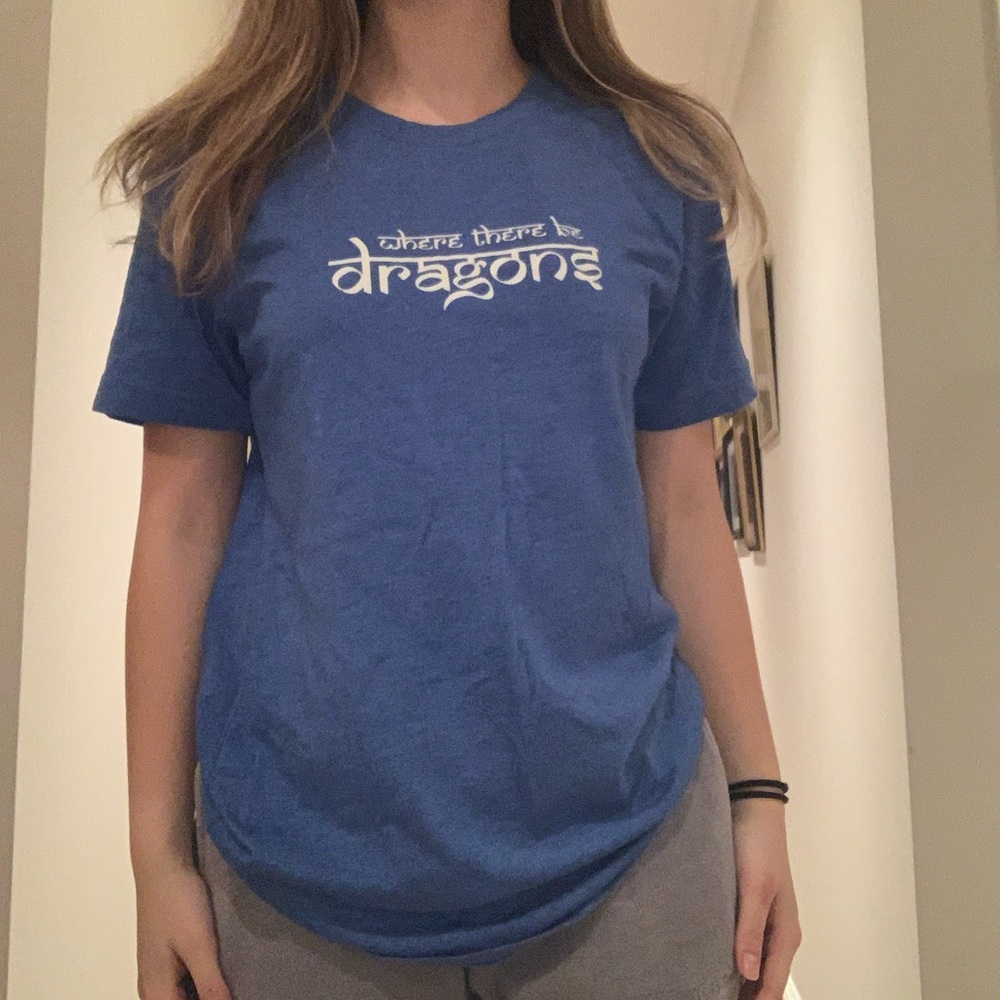US M unisex where there are dragons blue tee